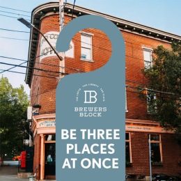 The essence of exceptional living a building with the message Be Three Places at Once