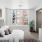 bedroom with bed and wall art